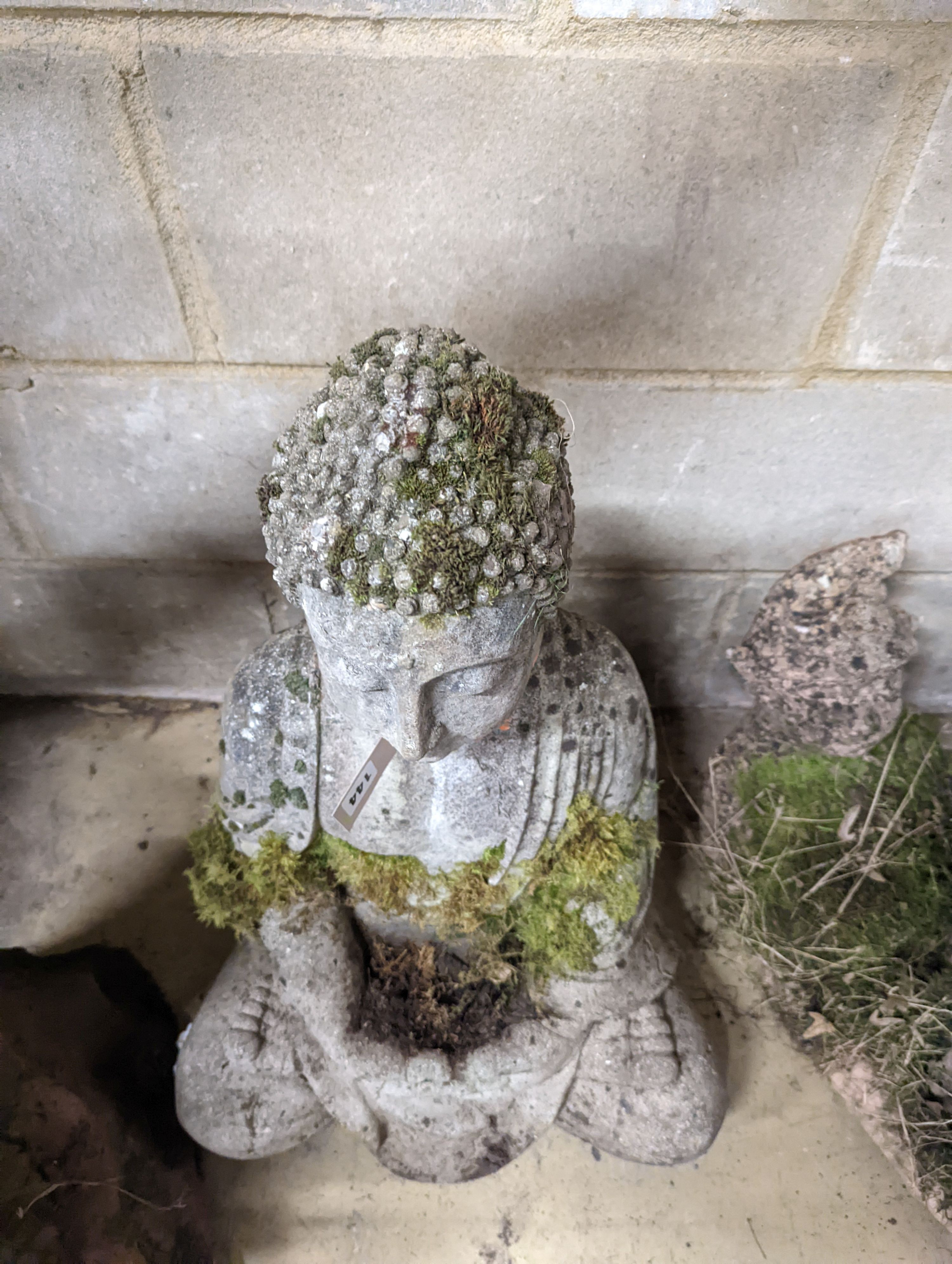 A reconstituted stone seated Buddha bird bath, height 64cm